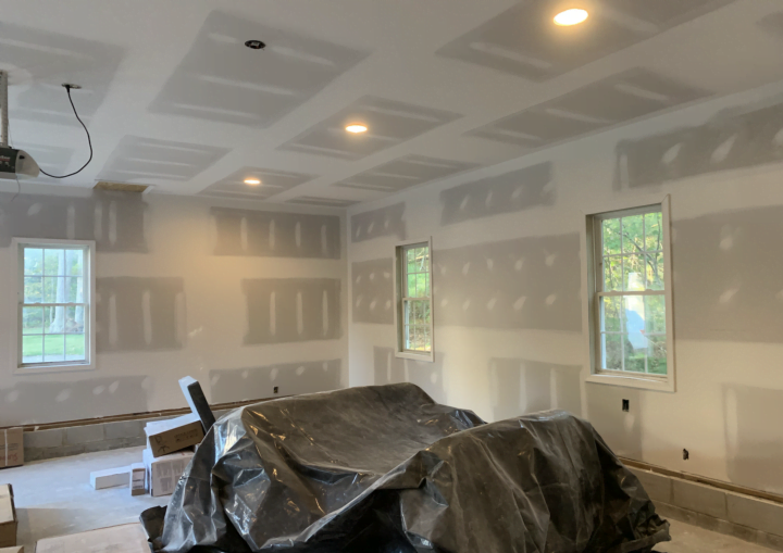 An indoor garage space primed and ready for painting