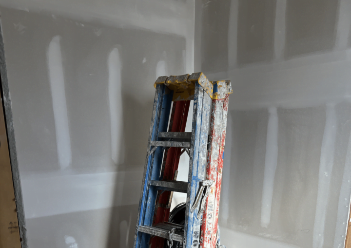 A commercial space is prepared for painting